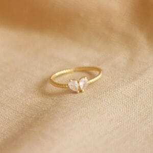 Elle gold plated minimalist ring jewelry. Minimalist gold ring with two zircon gems forming a heart. Affordable Jewelry Philippines